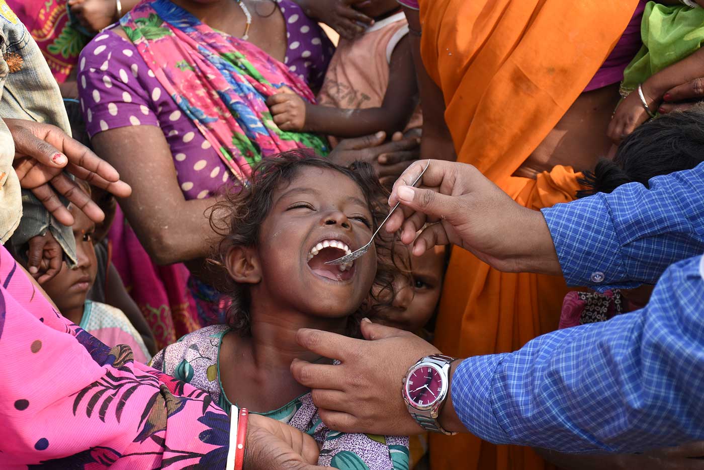 Child being dewormed